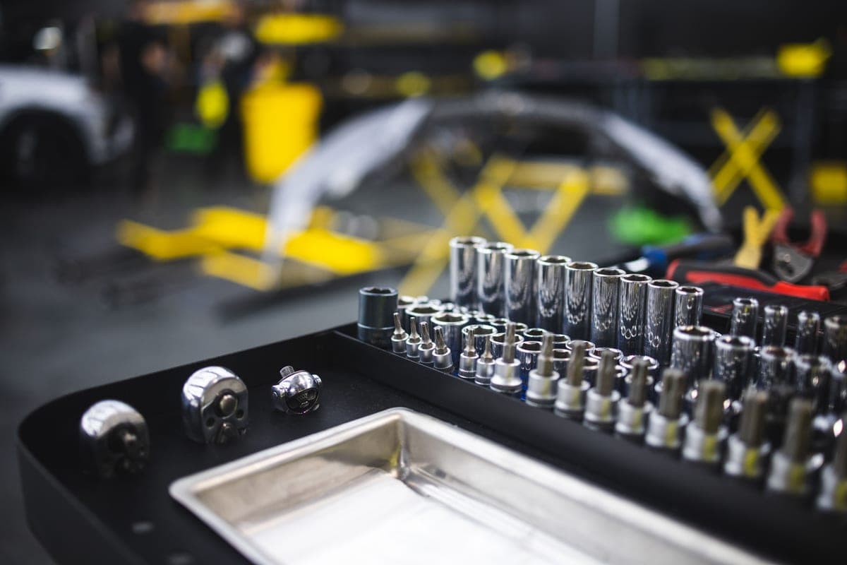 Mechanical hand tools laid out in a tool box